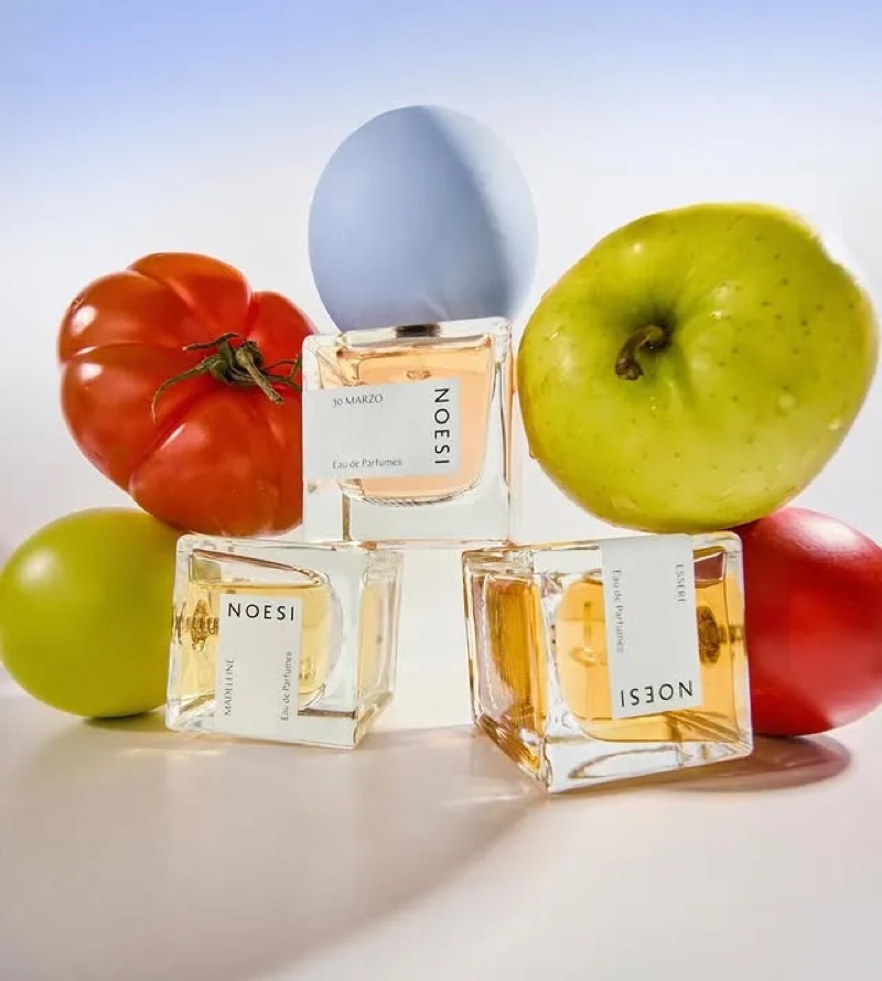 NOESI Still Life · by Laura Baiardini · perfume bottles, fruit still life, studio product