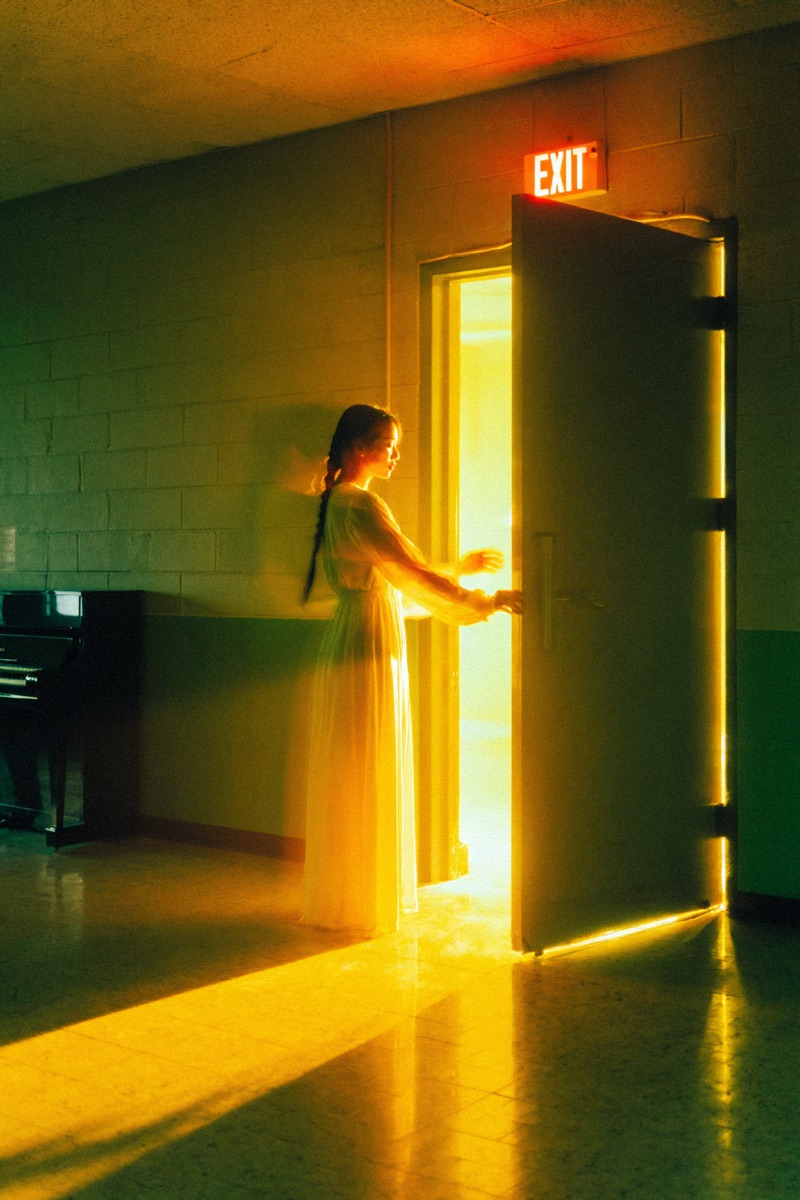 Exit Glow · by RABBAI · amber doorway, backlight, institutional space